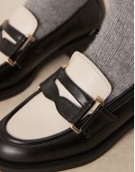 Kyden penny loafers in black and off white