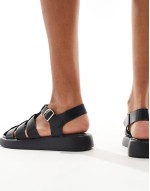 caged sandals in black