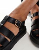 caged sandals in black
